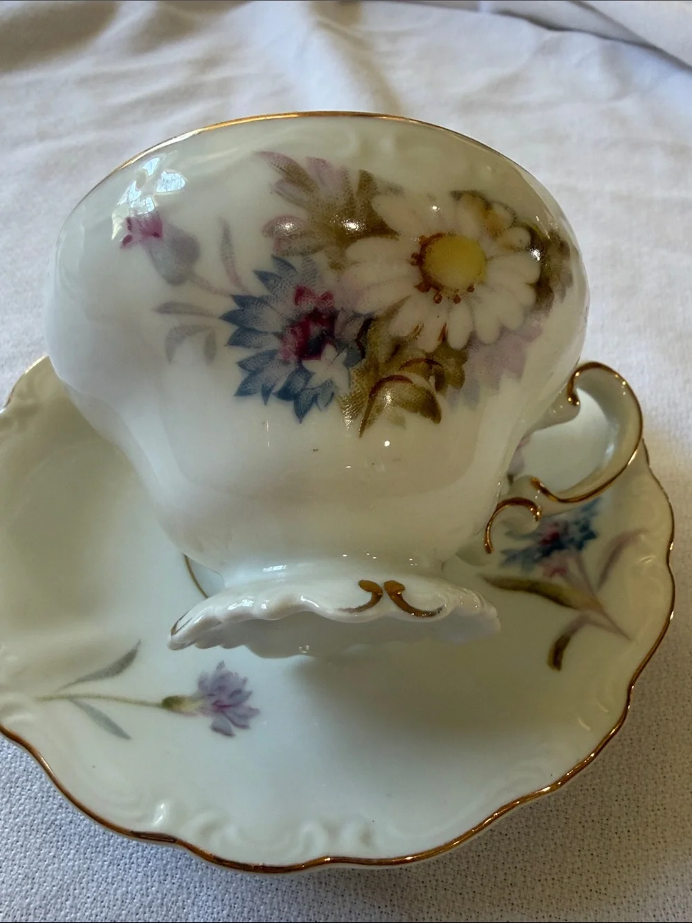 Occupied Japan Porcelain Floral Teacup and Saucer with Gold Trim